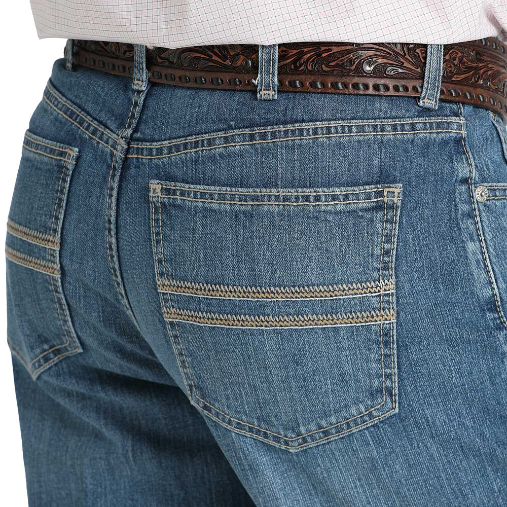 CINCH MEN'S WHITE LABEL RELAXED STRAIGHT LEG PERFORMANCE RELAXED JEANS - MEDIUM WASH