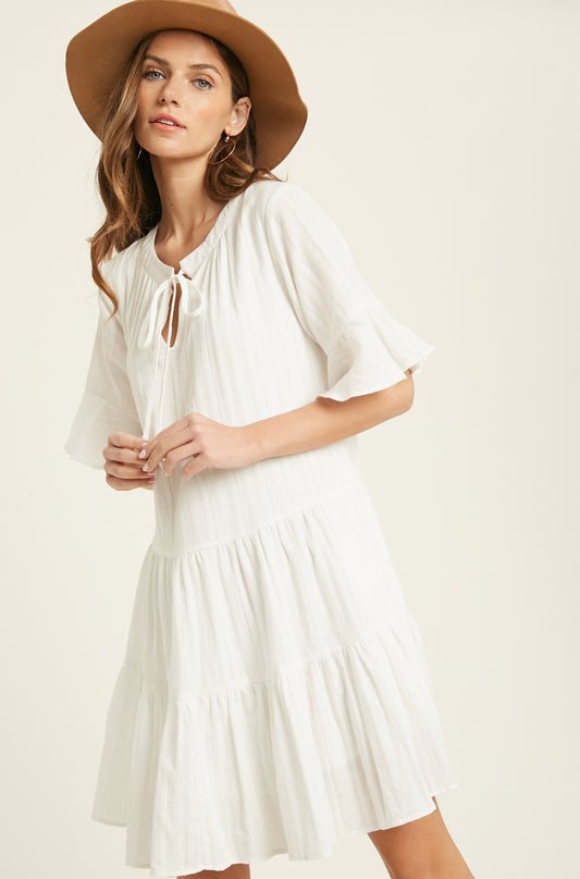 BELL SLEEVE TIERED MINI DRESS in IVORY