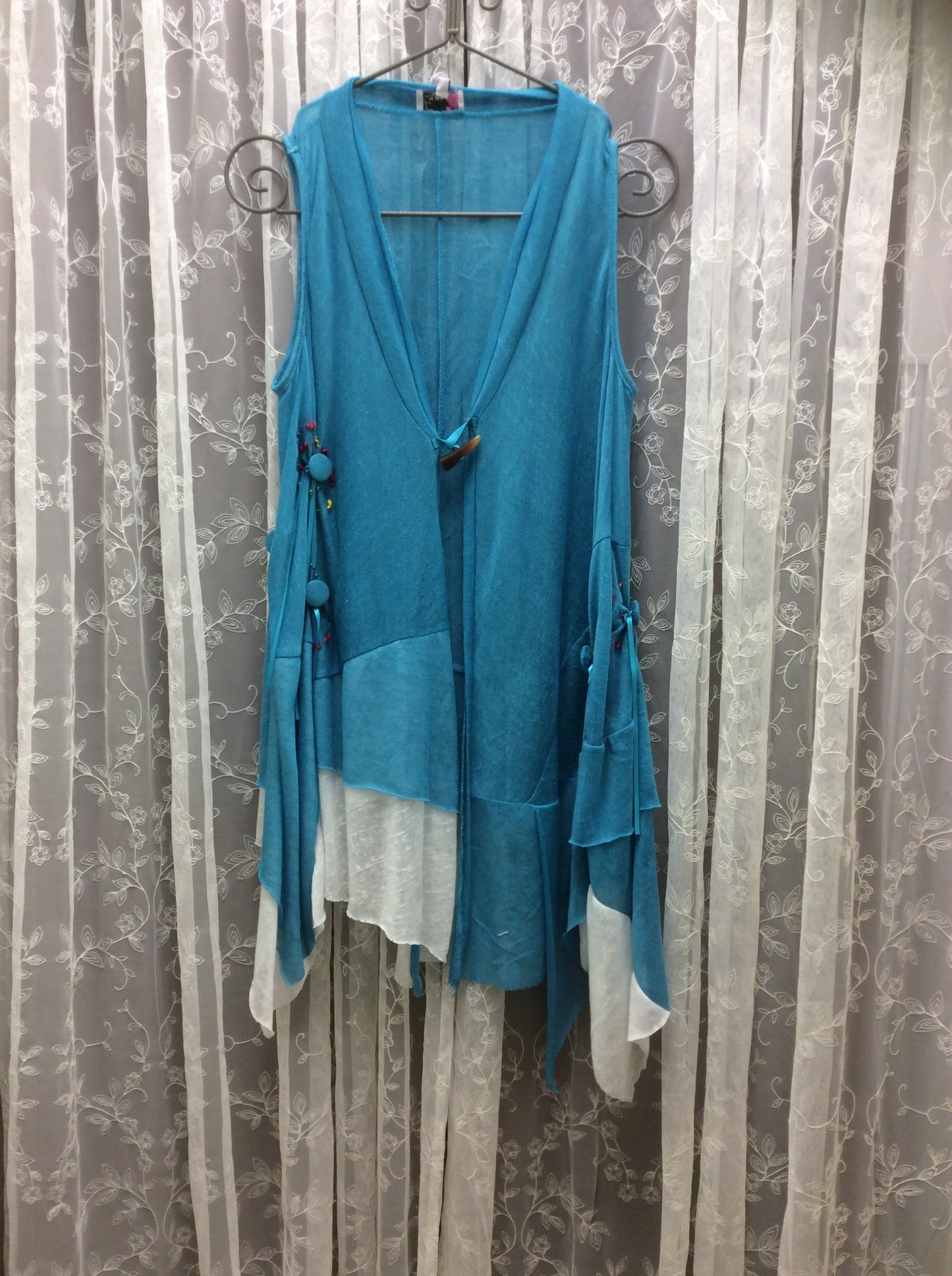 Ruffled Blue Vest with Button Detail